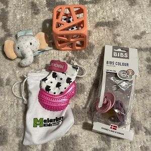 Baby teether set.  Bibs pacifiers (6-18m), munch mitt, teether toy & hand rattle